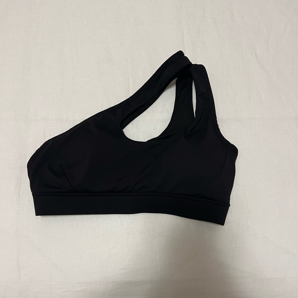 Cross shoulder sports bra